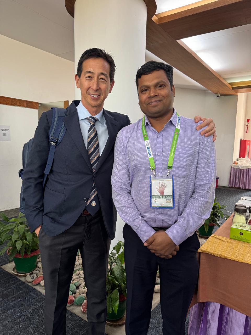 With a foreign Faculty in a Hand Conference in Dhaka, Bangladesh